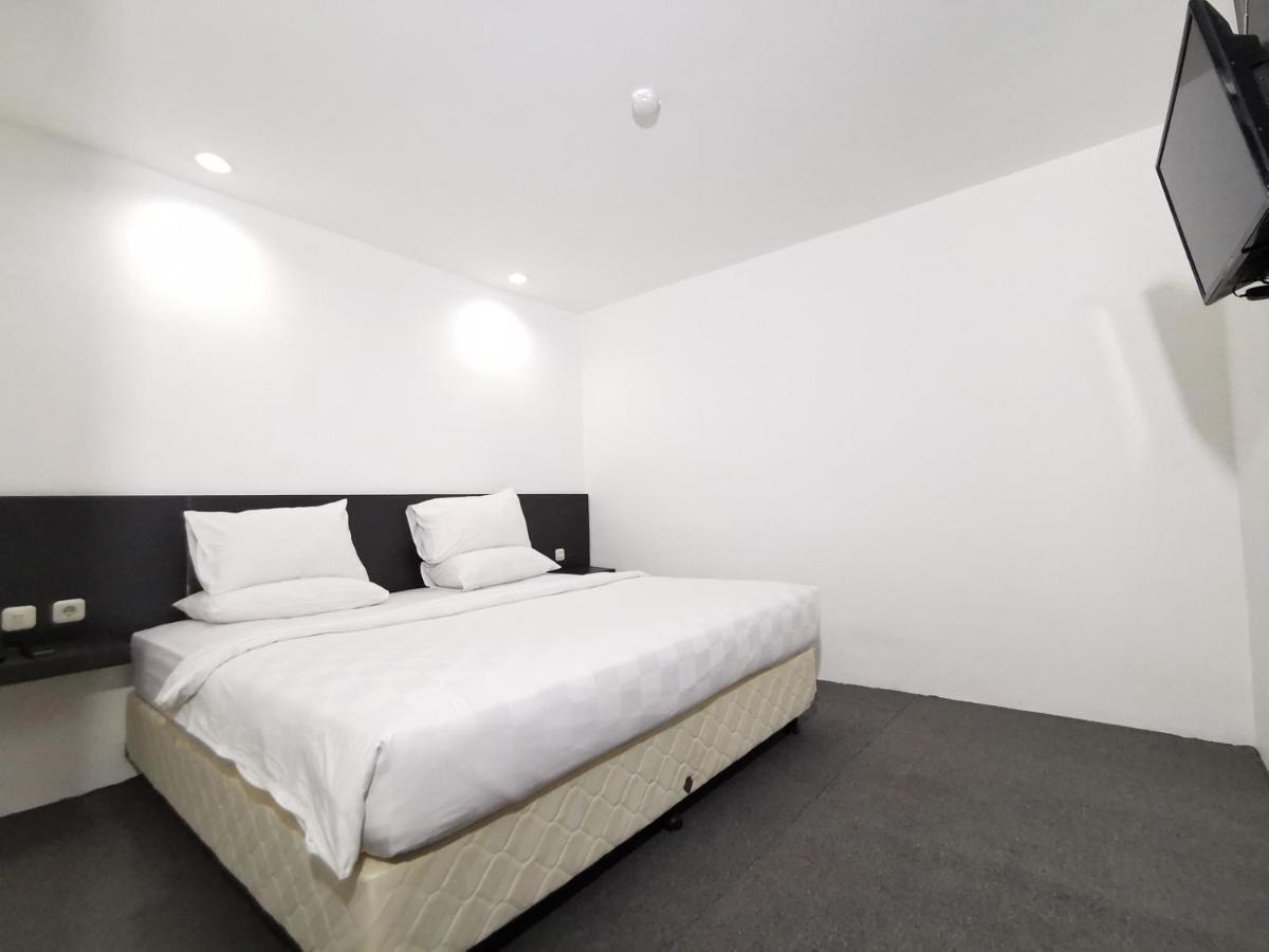 Heavenly Land Family Hotel Palembang Extérieur photo